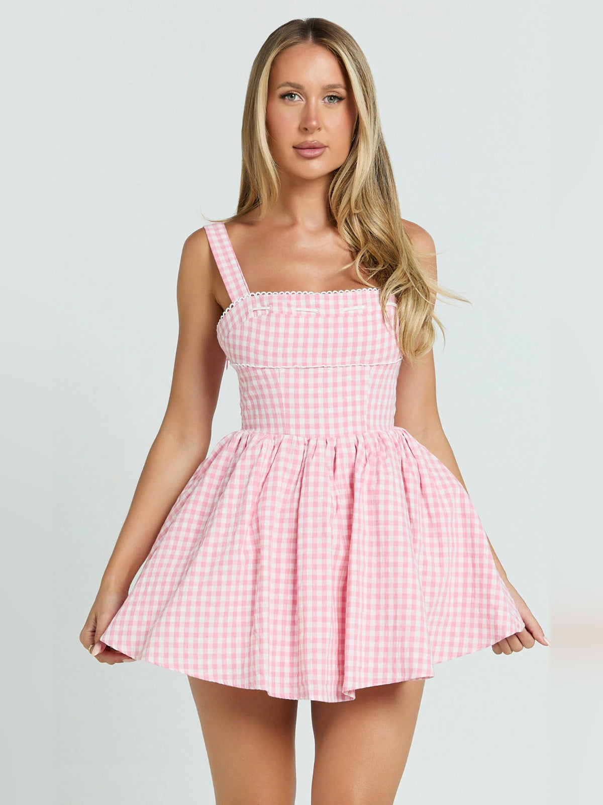 Pink mini homecoming dress, alternate view showing the dress shape and hem