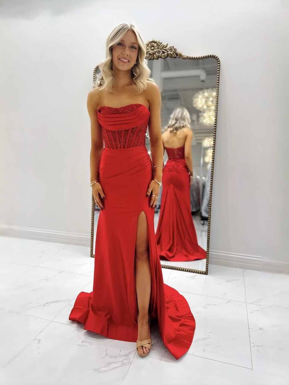 Red floor-length prom dress, alternate view showing the dress shape and hem