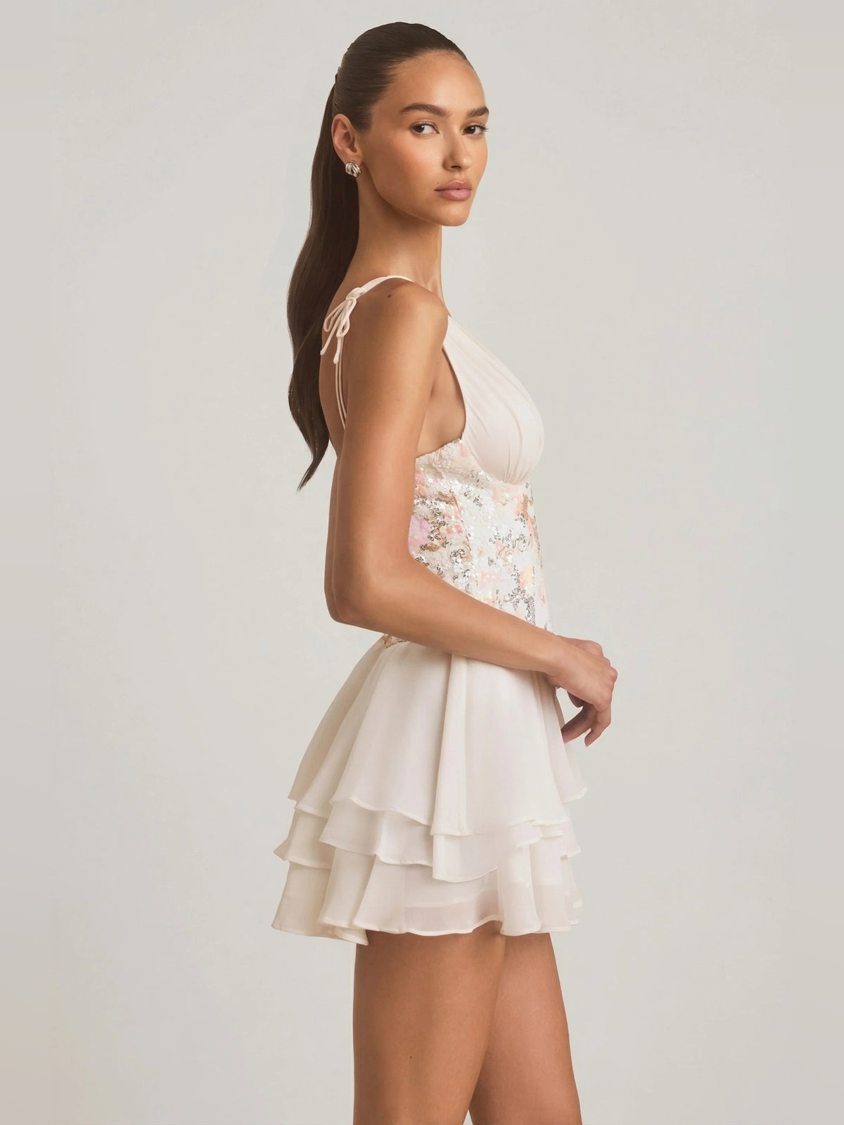 Ivory mini homecoming dress, alternate view showing the dress shape and hem