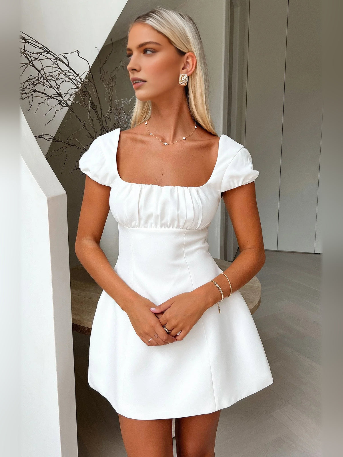Ivory white mini homecoming dress, alternate view showing the dress shape and hem