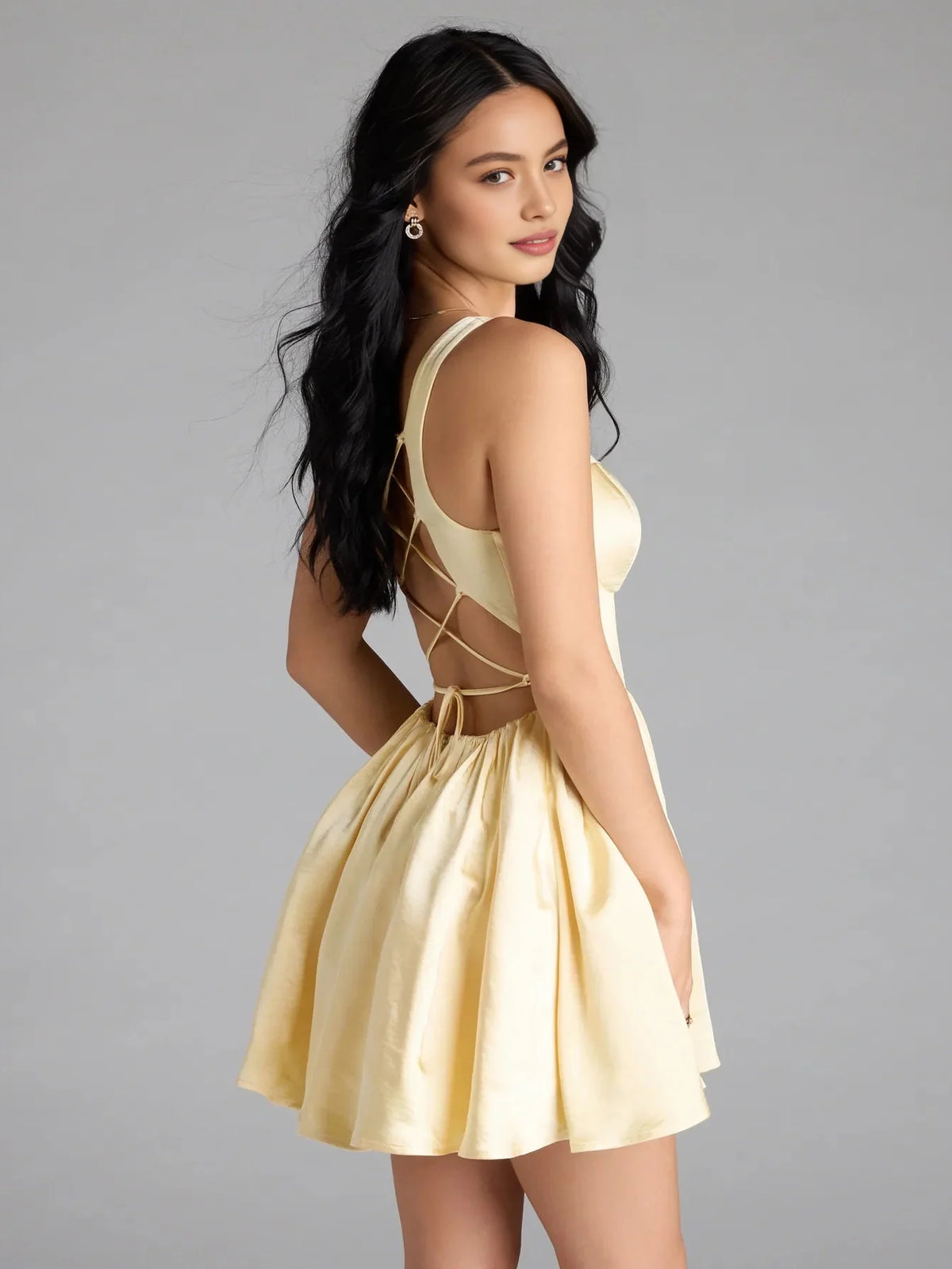Canary mini homecoming dress, alternate view showing the dress shape and hem