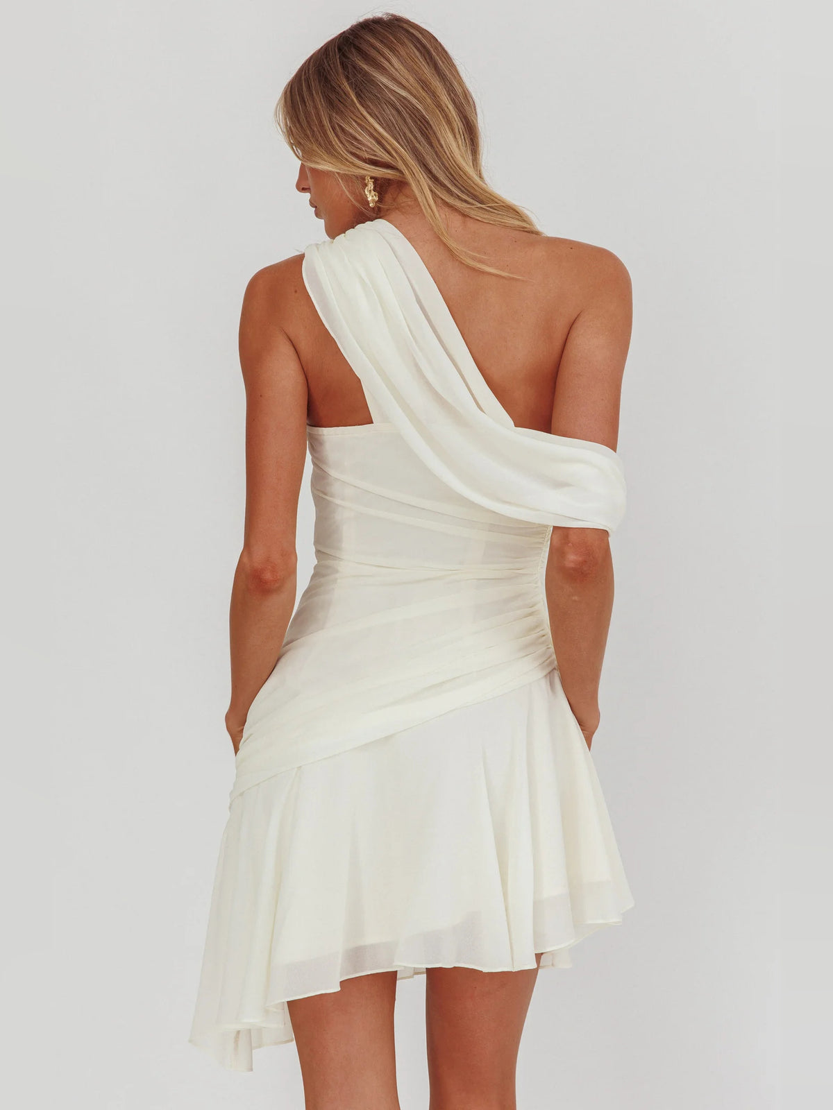 Cream mini homecoming dress, alternate view showing the dress shape and hem