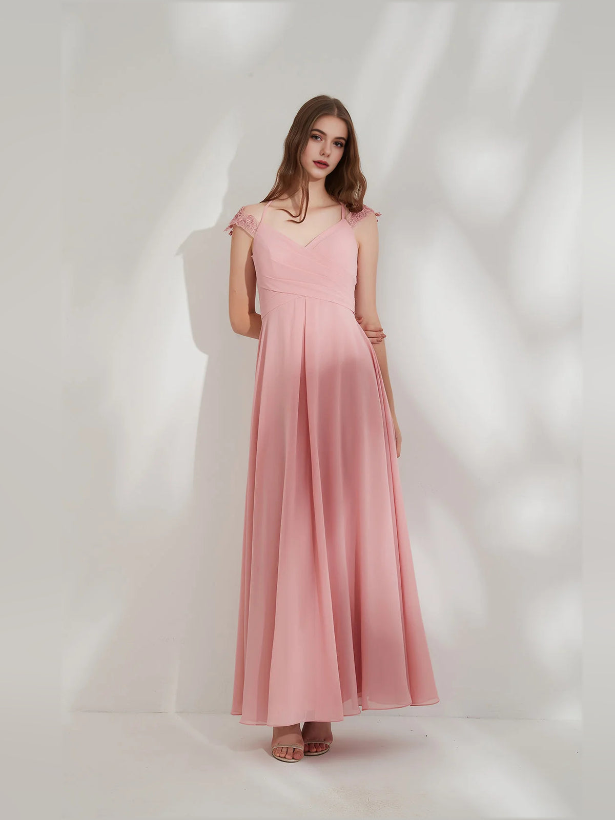 Pink floor-length bridesmaid dress, alternate view showing the dress shape and hem