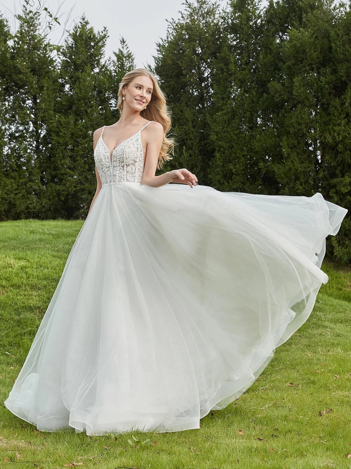 Ivory floor-length wedding dress, alternate view showing the dress shape and hem