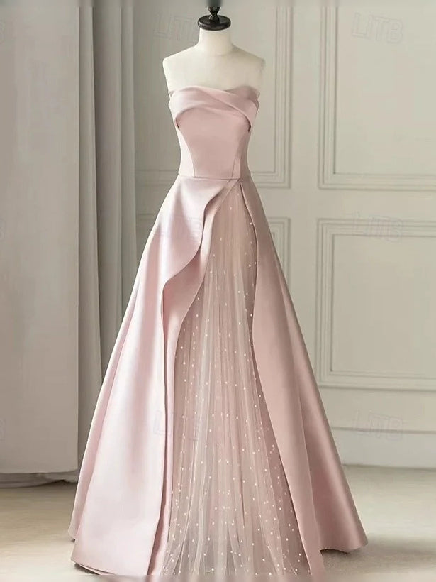 Blush Pink maxi prom dress, alternate view showing the dress shape and hem