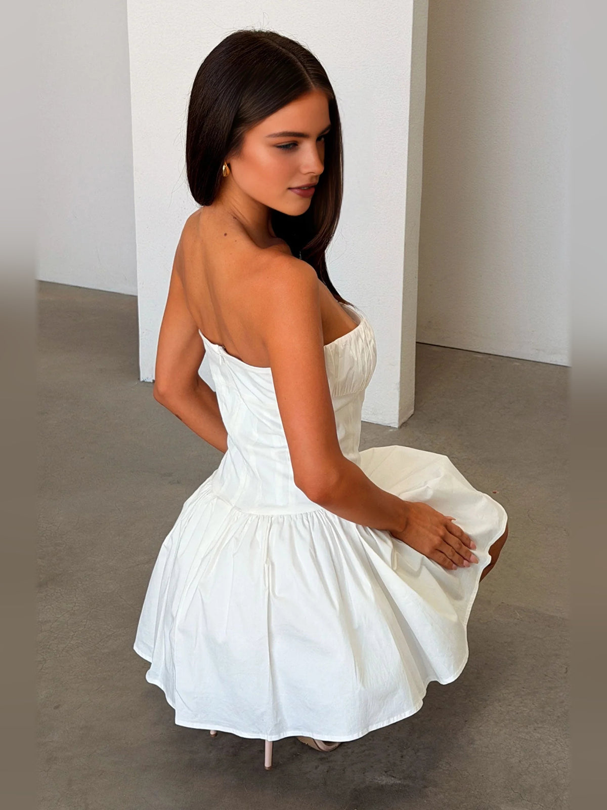Ivory white mini homecoming dress, alternate view showing the dress shape and hem