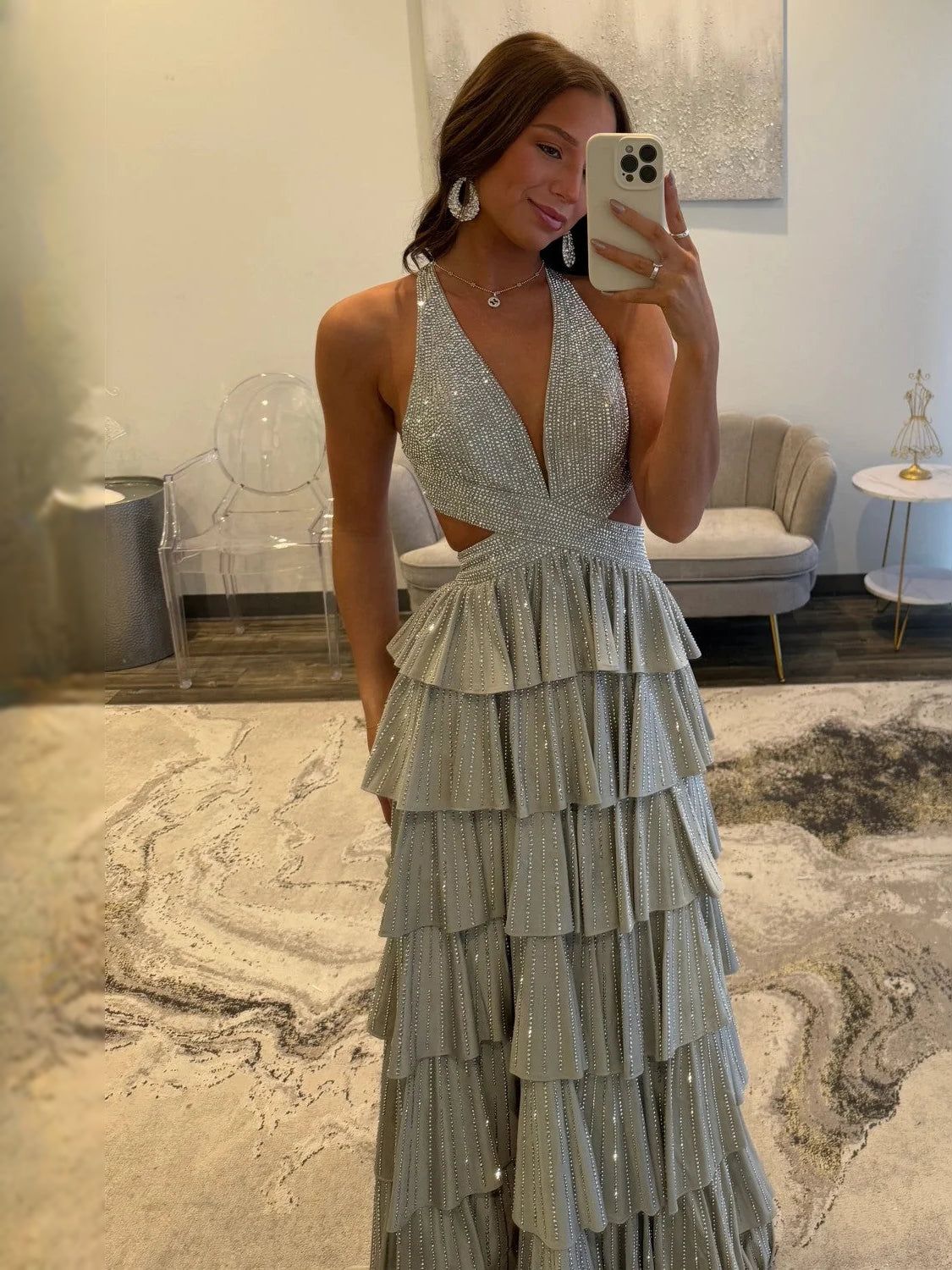 Silver floor-length prom dress, alternate view showing the dress shape and hem