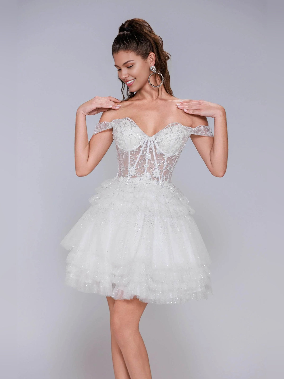 White short homecoming dress, alternate view showing the dress shape and hem