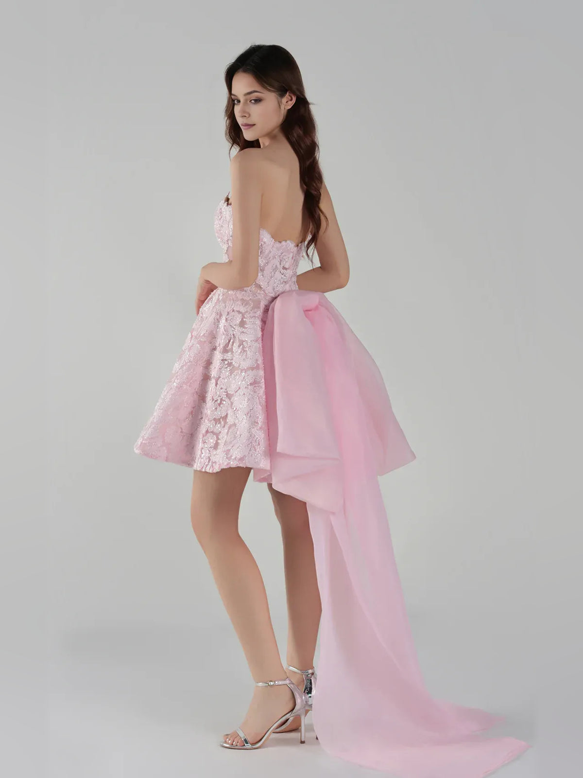 Light Pink mini homecoming dress, alternate view showing the dress shape and hem