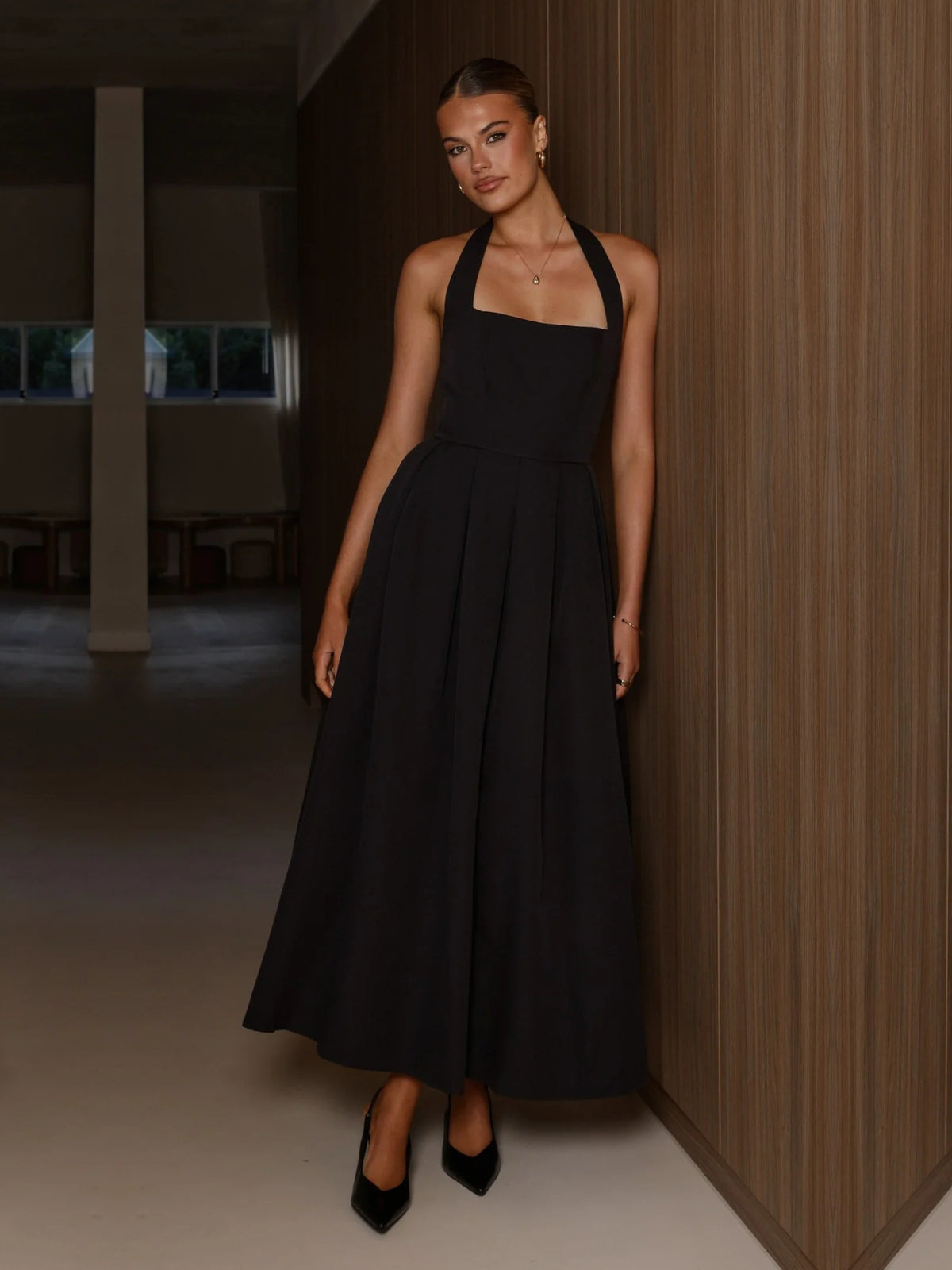 Black a-line maxi formal dress with halter neckline, alternate view
