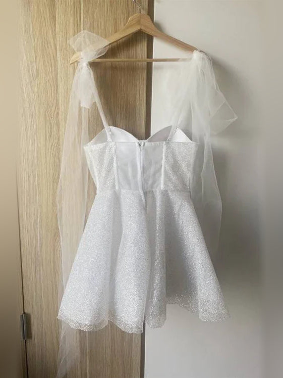 Ivory short homecoming dress, alternate view showing the dress shape and hem