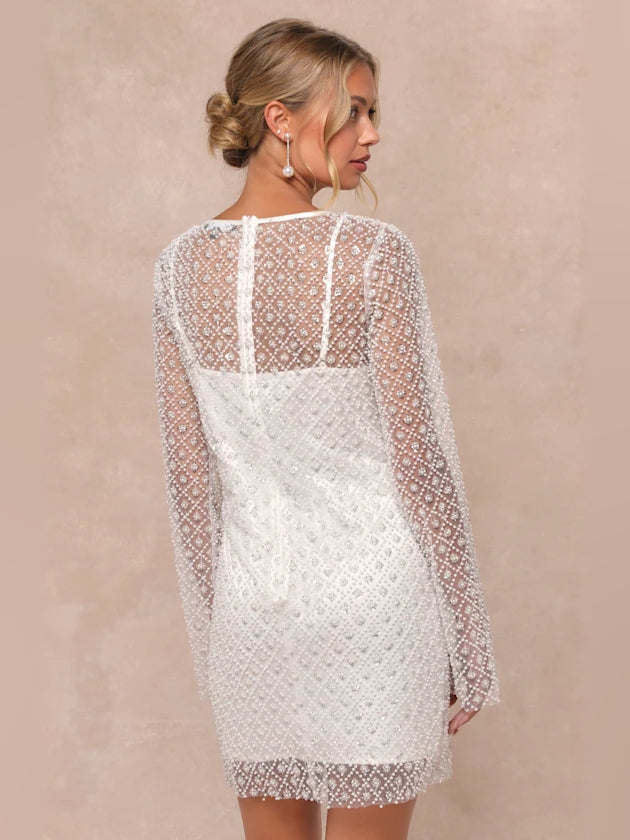 White mini homecoming dress, alternate view showing the dress shape and hem