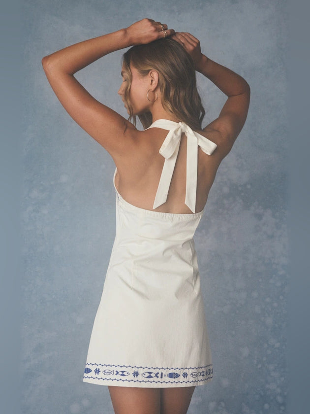 White mini homecoming dress, alternate view showing the dress shape and hem