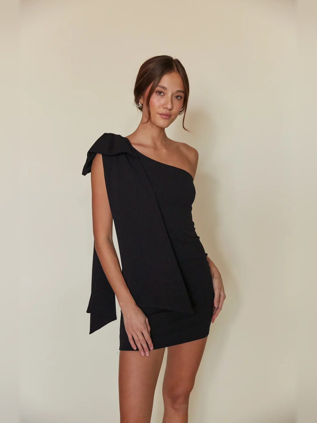 Orange mini homecoming dress, alternate view showing the dress shape and hem