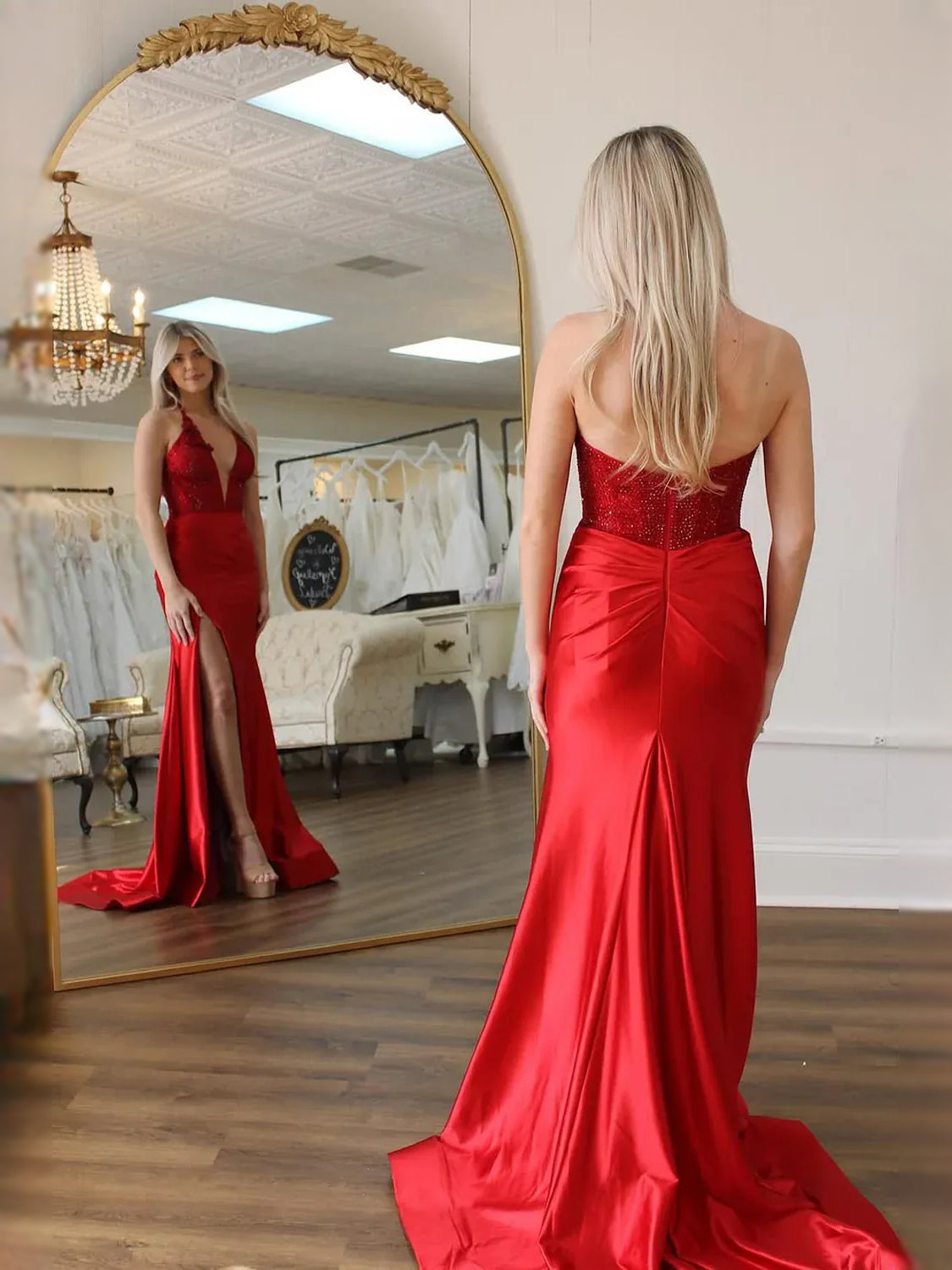 Red floor-length prom dress, alternate view showing the dress shape and hem