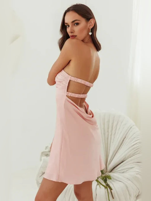 White mini homecoming dress, alternate view showing the dress shape and hem