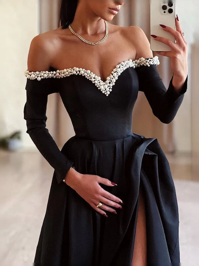 Black floor-length prom dress, alternate view showing the dress shape and hem