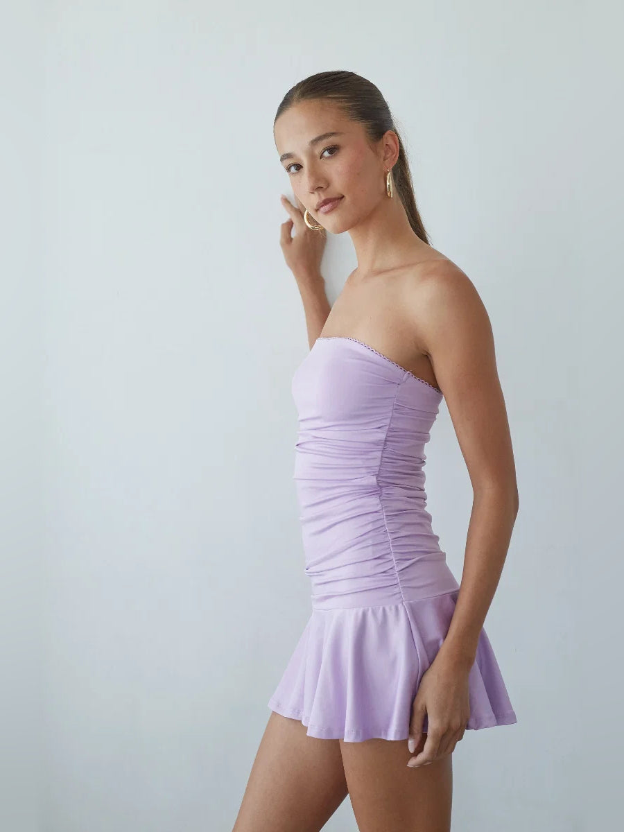 Orange mini homecoming dress, alternate view showing the dress shape and hem