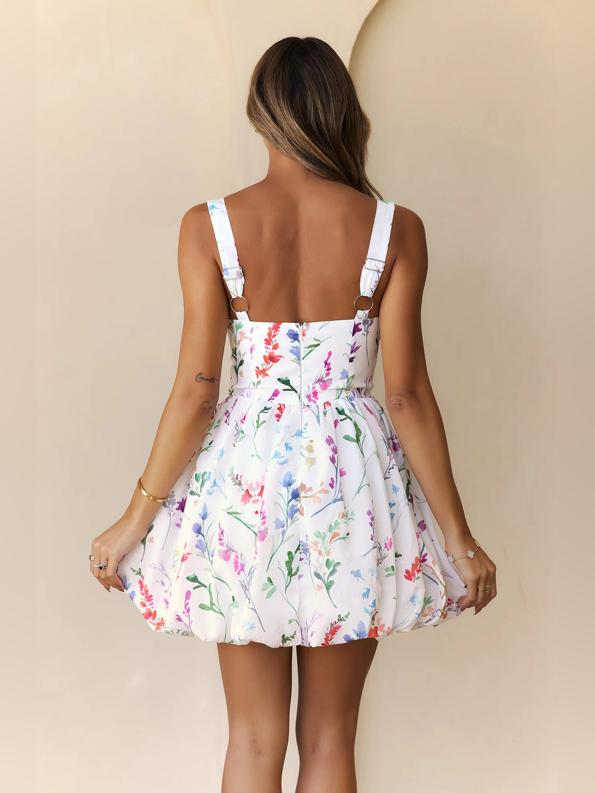 White mini homecoming dress, alternate view showing the dress shape and hem