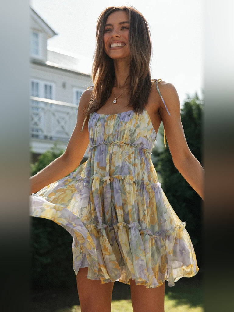Floral mini homecoming dress, alternate view showing the dress shape and hem