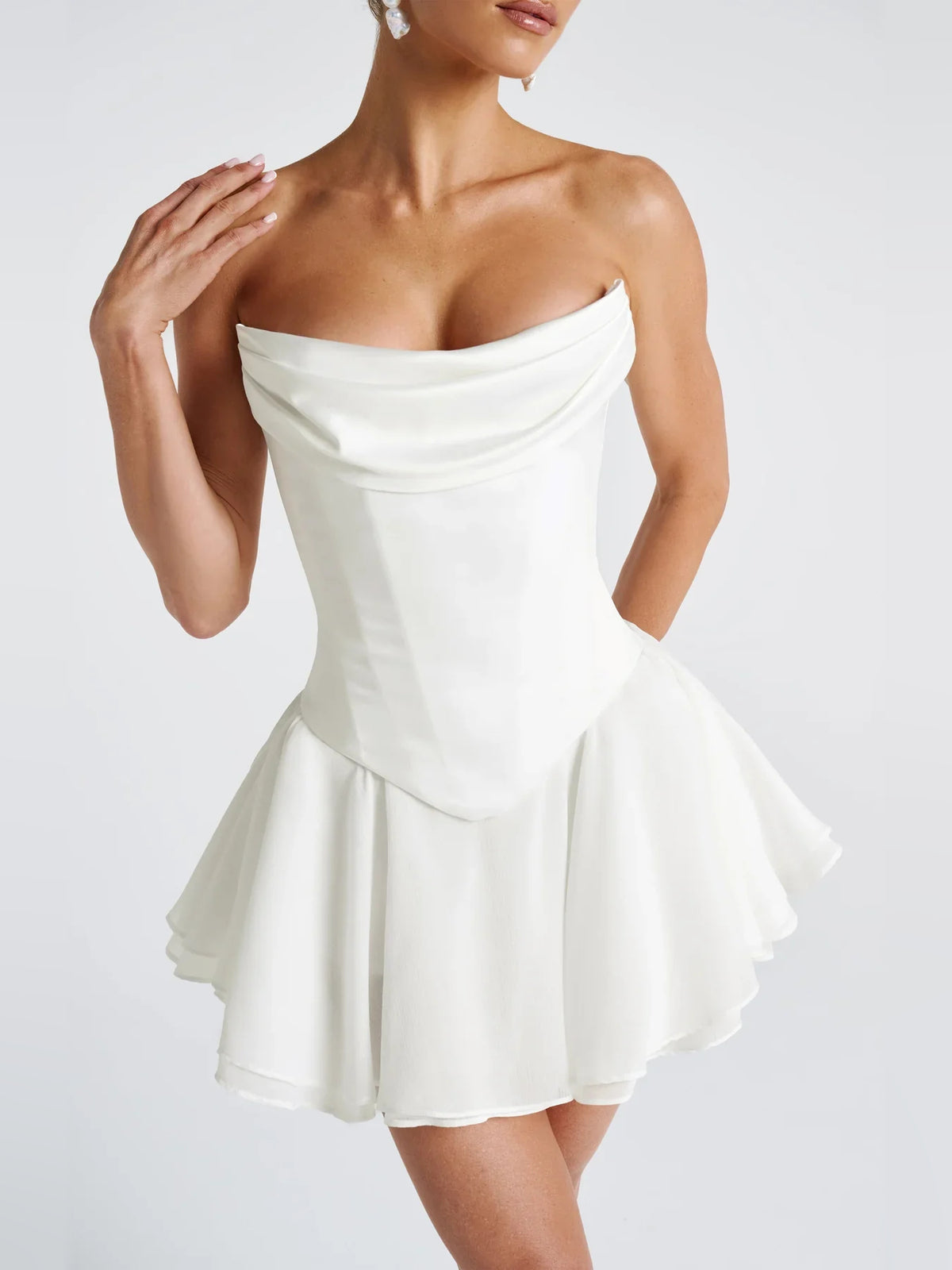 White mini homecoming dress, alternate view showing the dress shape and hem