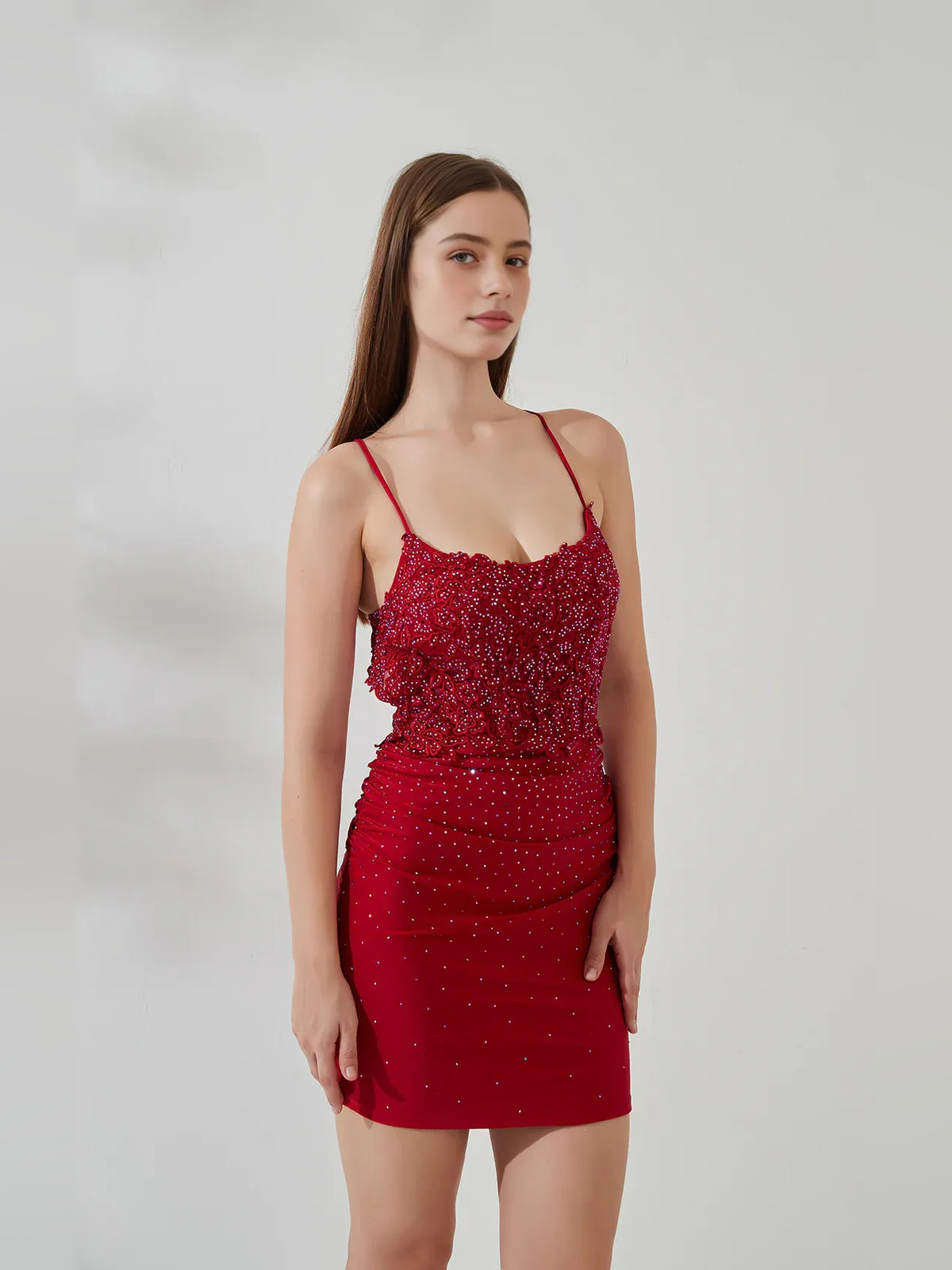 Red mini homecoming dress, alternate view showing the dress shape and hem
