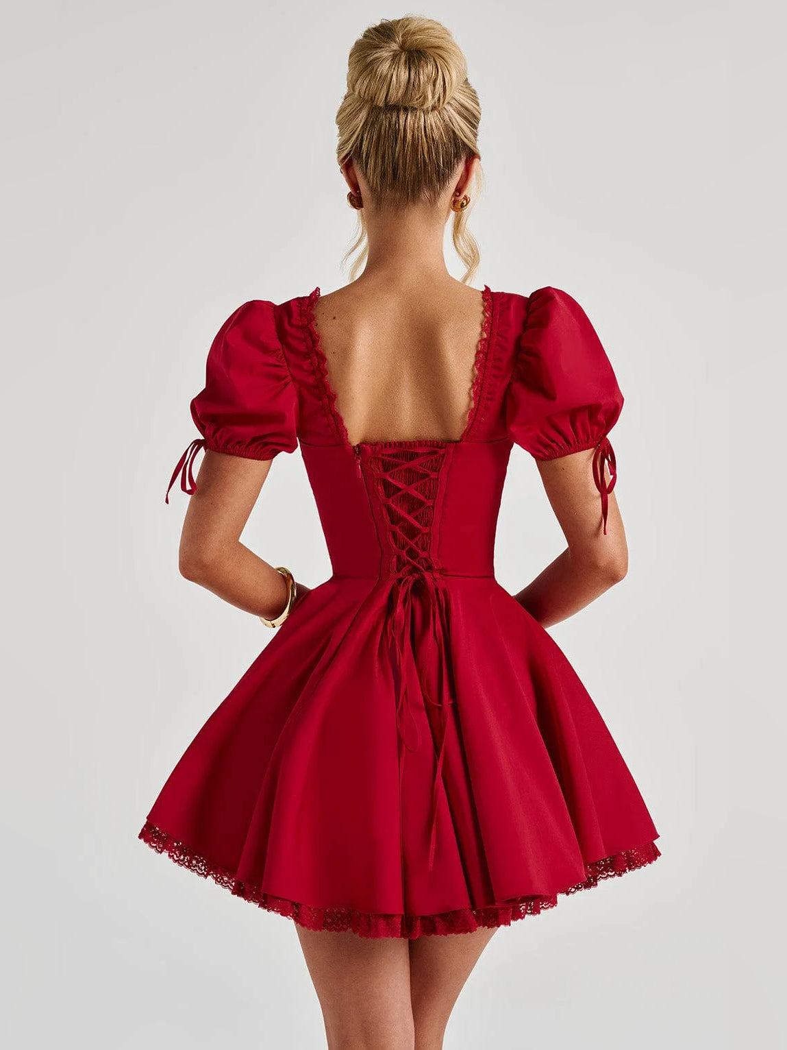 Red mini homecoming dress, alternate view showing the dress shape and hem