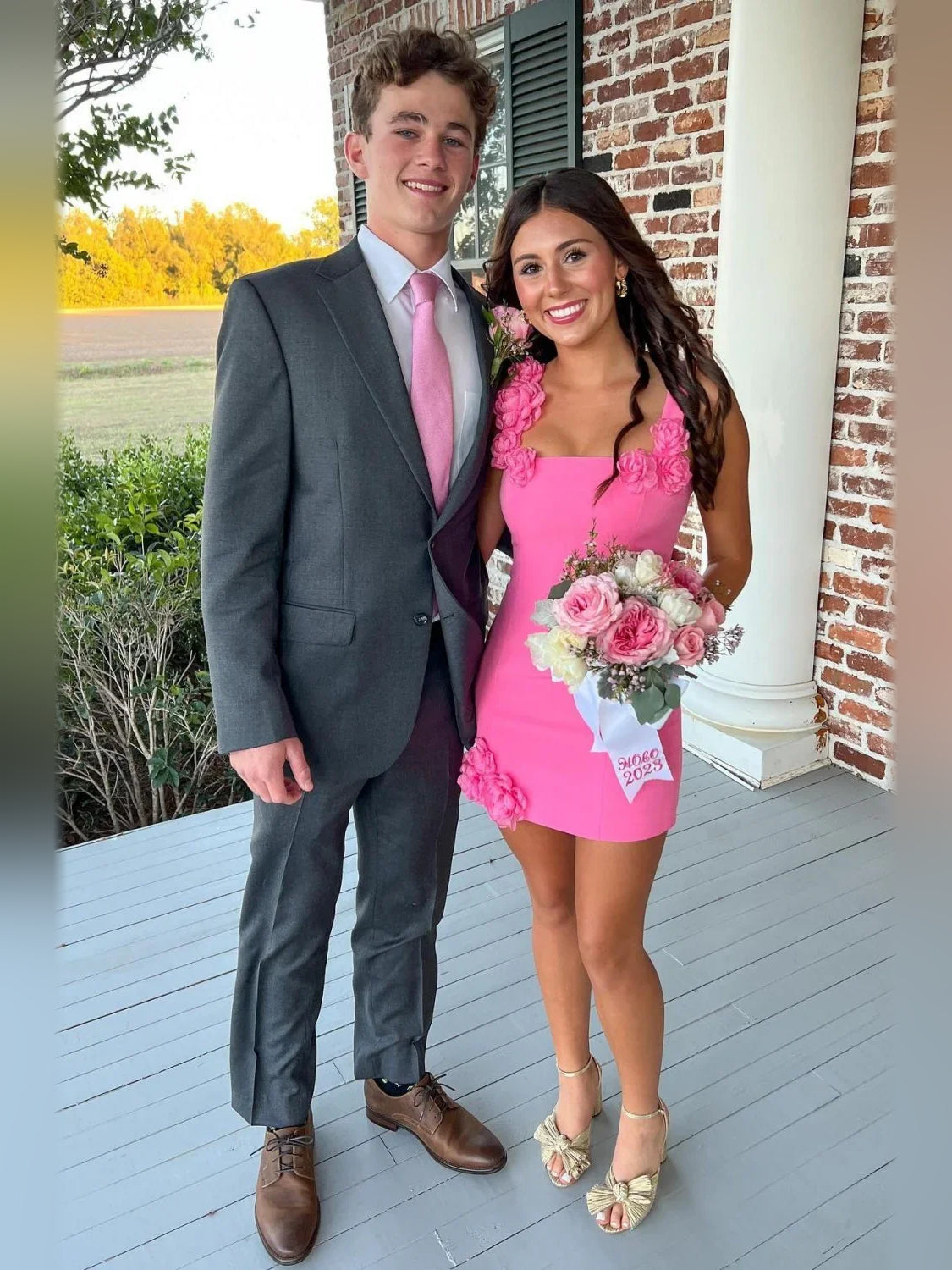Pink mini homecoming dress, alternate view showing the dress shape and hem