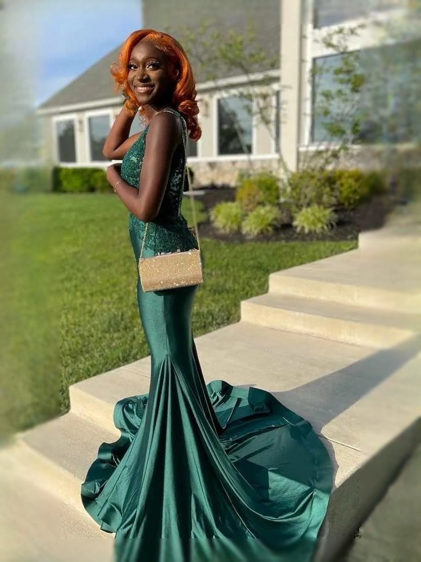 Emerald Green maxi prom dress, back view showing the rear of the dress from another angle