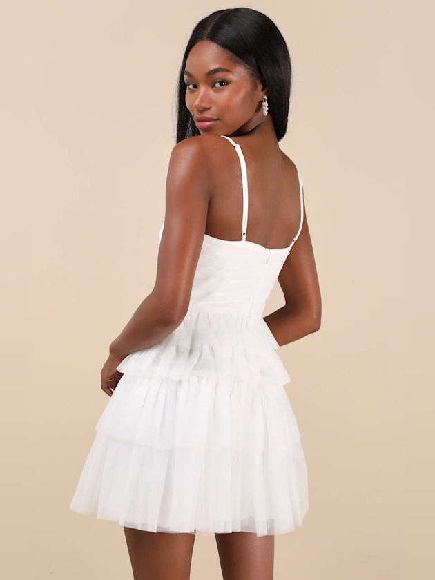 White mini homecoming dress, alternate view showing the dress shape and hem