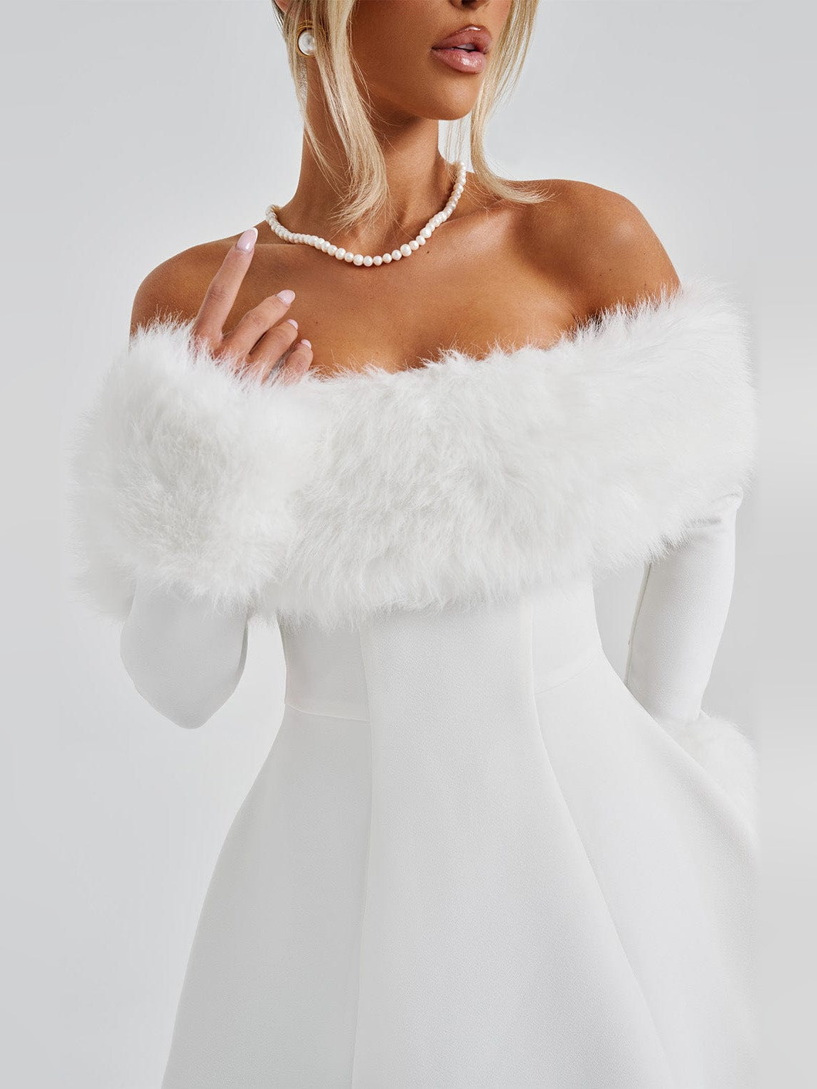 Ivory mini homecoming dress, alternate view showing the dress shape and hem