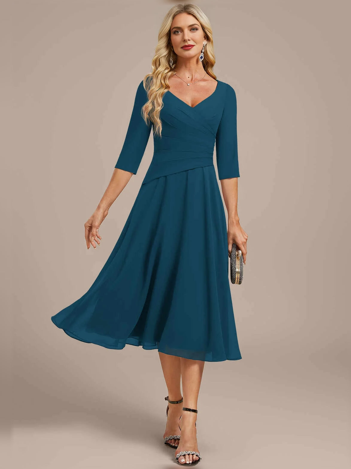 Blue Velvet knee-length mother of the bride dress, alternate view showing the dress shape and hem