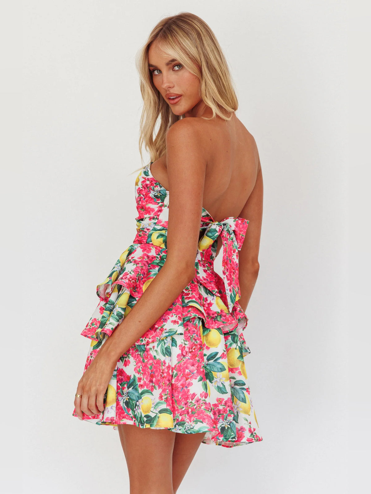 Pink mini homecoming dress, alternate view showing the dress shape and hem