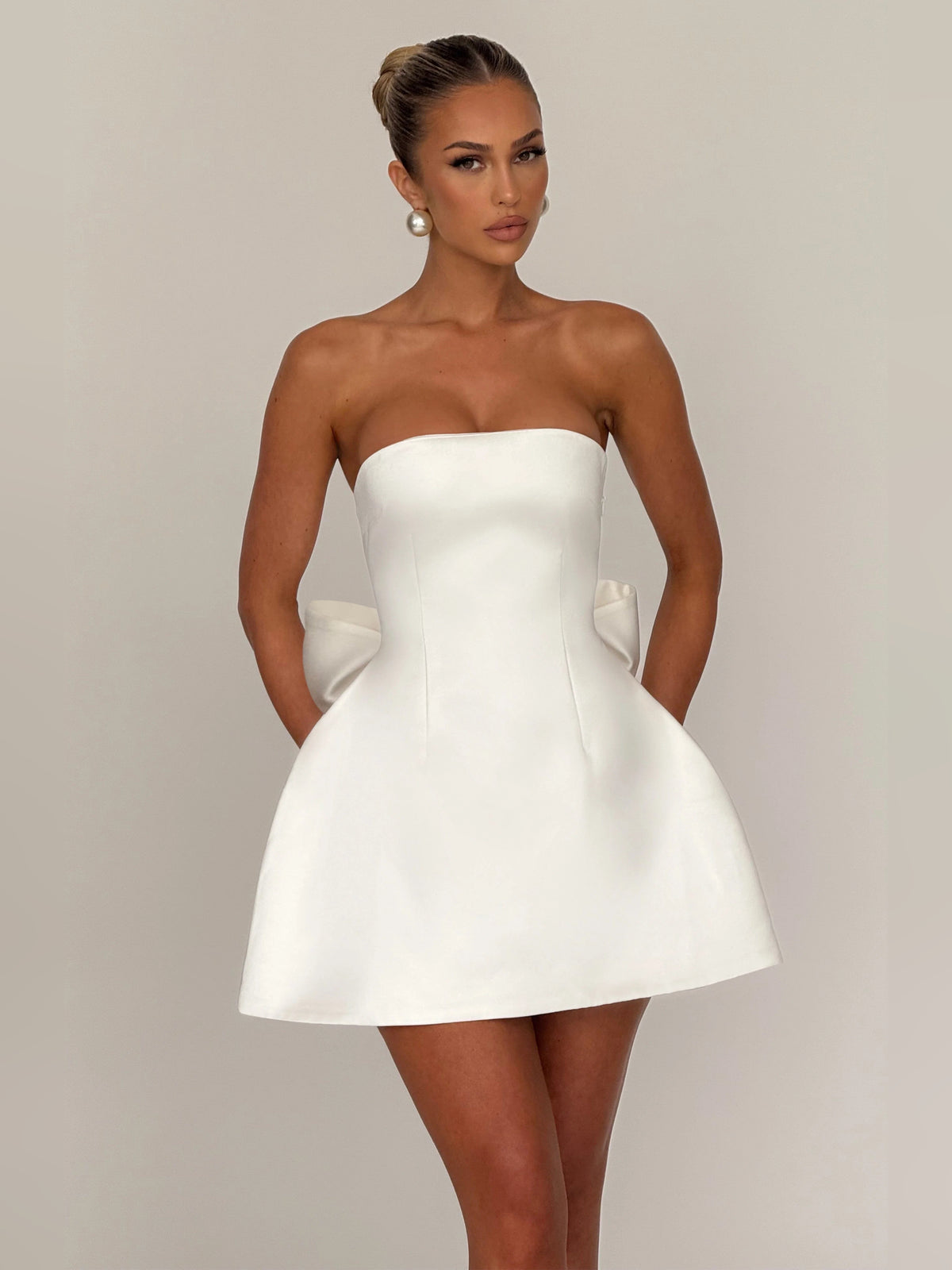 Ivory mini homecoming dress, alternate view showing the dress shape and hem
