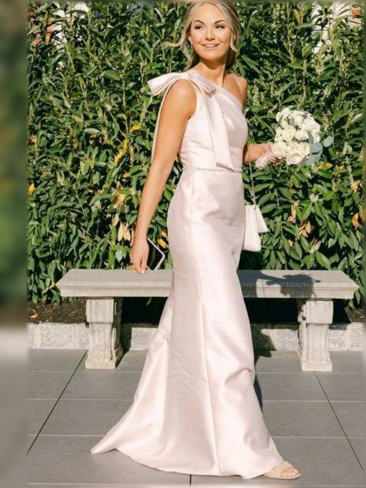 Pink floor-length bridesmaid dress, alternate view showing the dress shape and hem