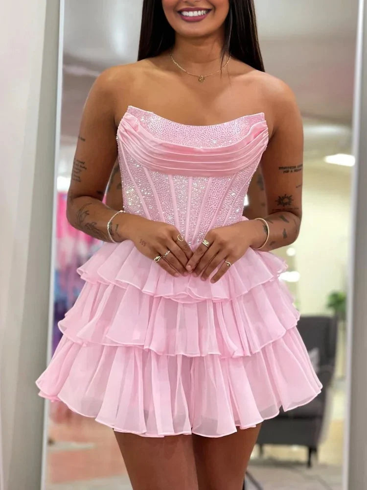 Blush Pink mini homecoming dress, alternate view showing the dress shape and hem