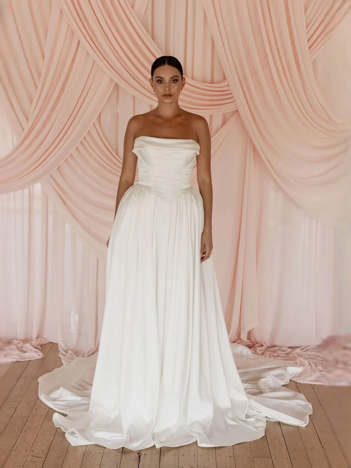 Ivory floor-length wedding dress, alternate view showing the dress shape and hem