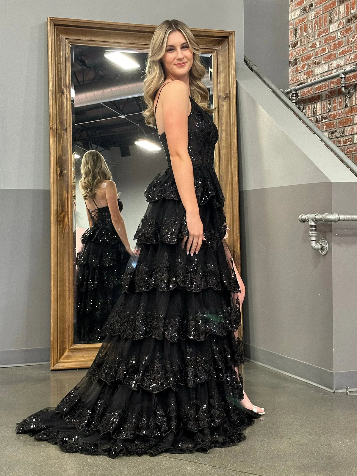 Black maxi prom dress, alternate view showing the dress shape and hem