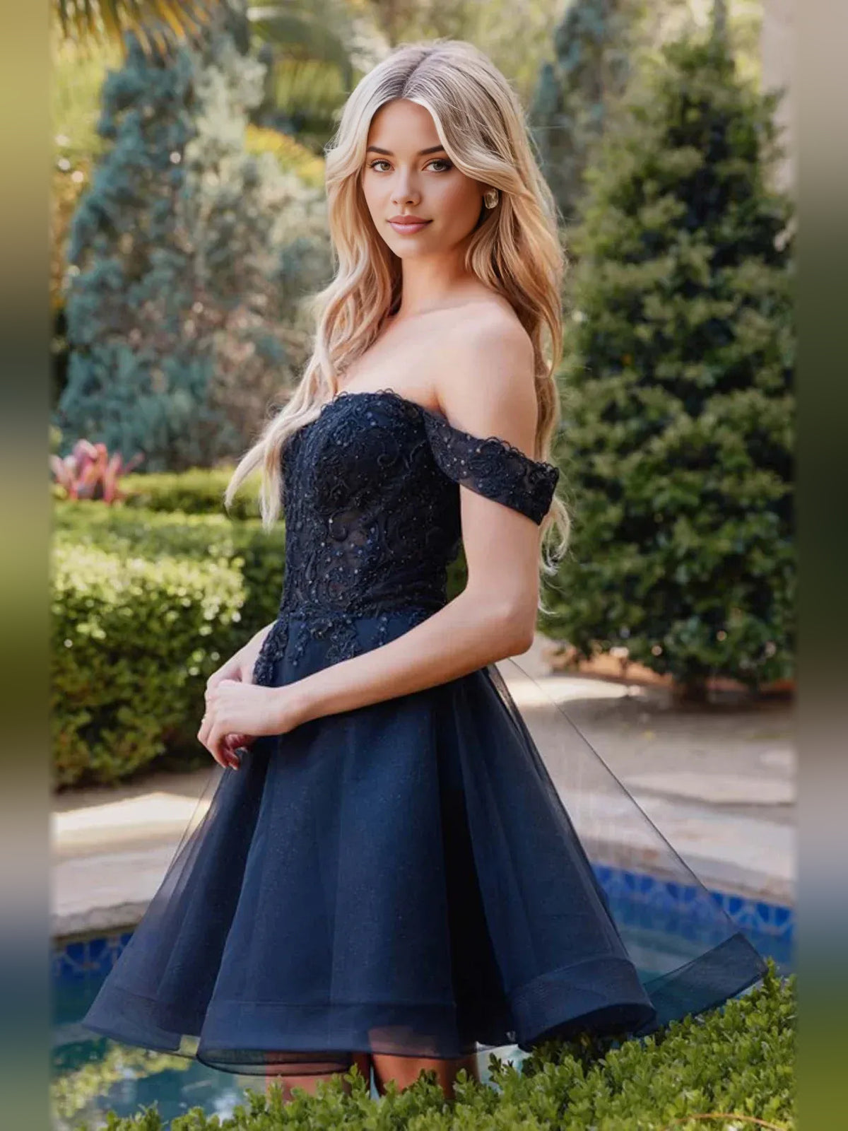 Black short homecoming dress, alternate view showing the dress shape and hem