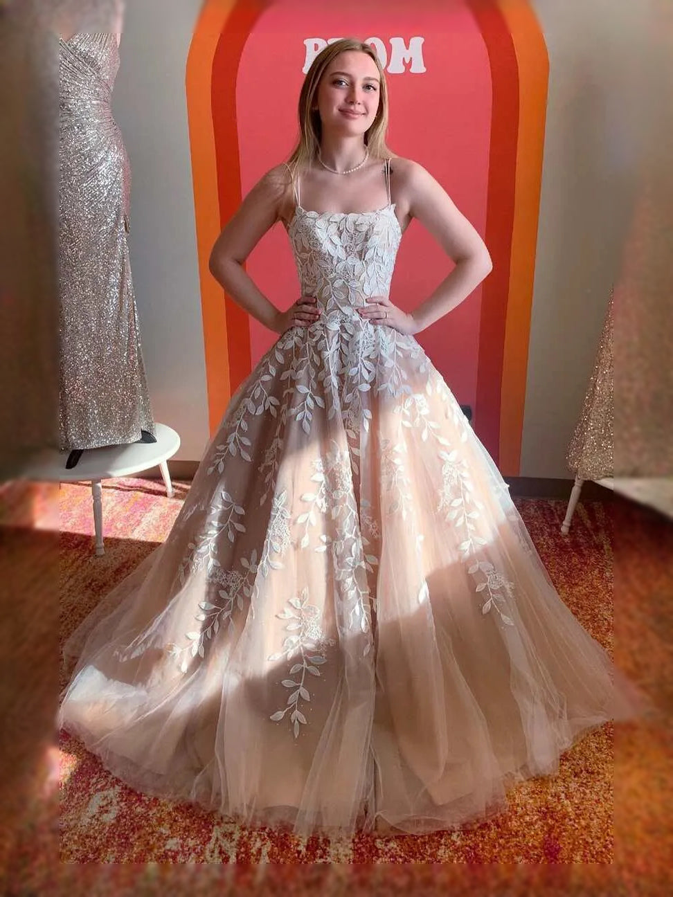 Apricot maxi prom dress, back view showing the rear of the dress