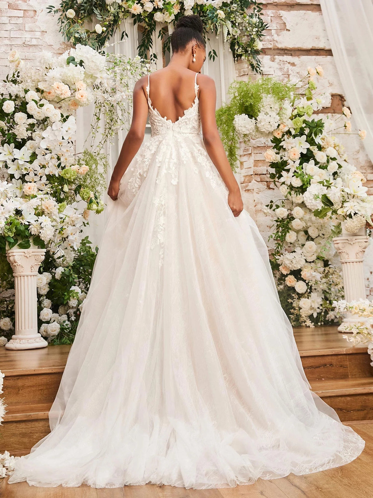 Ivory floor-length wedding dress, alternate view showing the dress shape and hem