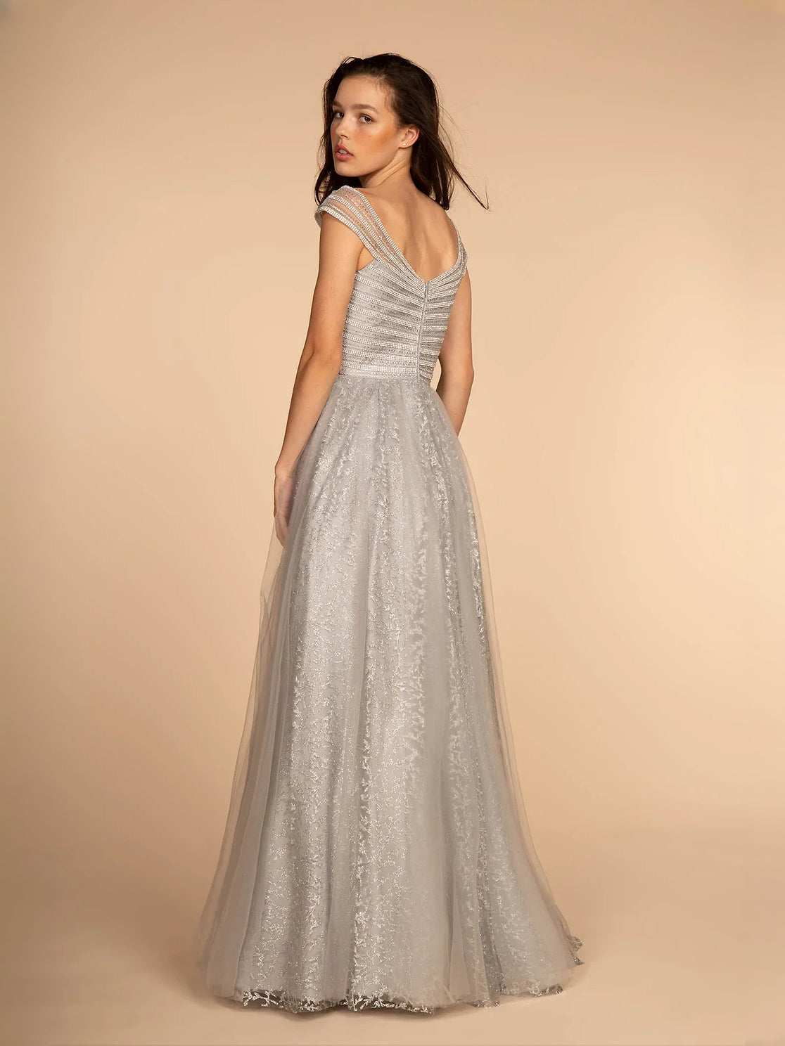 Silver floor-length prom dress, alternate view showing the dress shape and hem