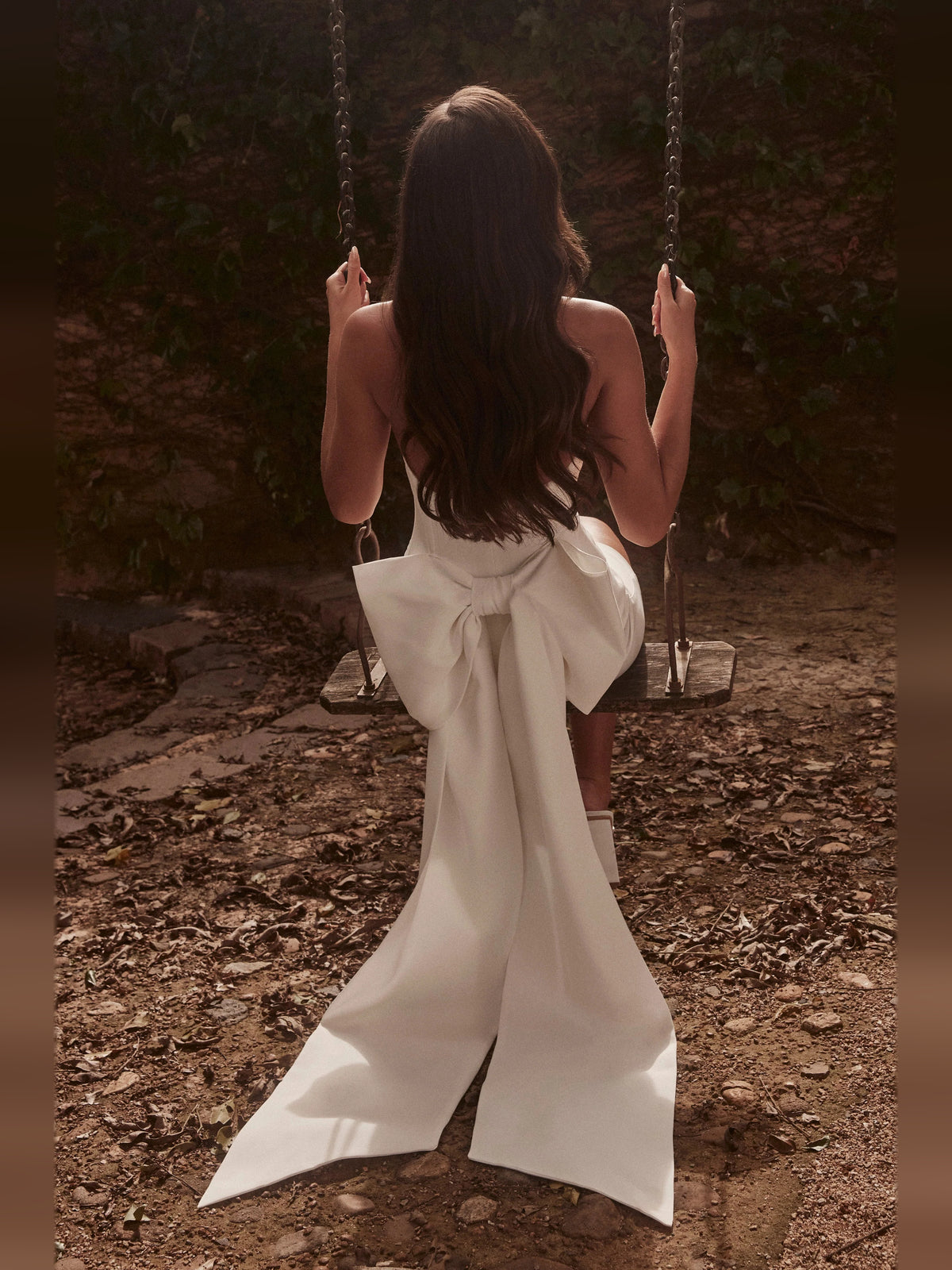 White mini homecoming dress, alternate view showing the dress shape and hem