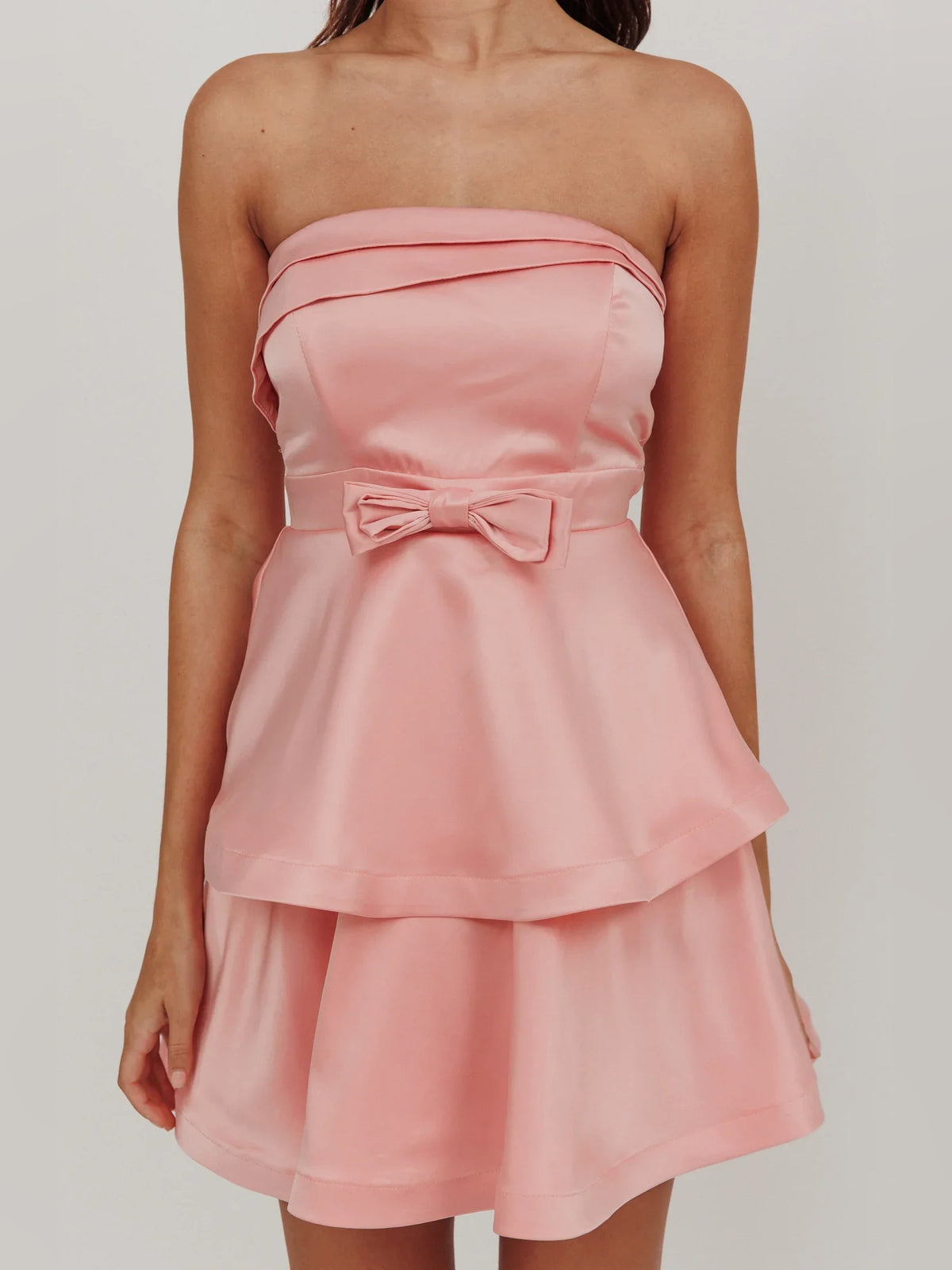 Pink mini homecoming dress, alternate view showing the dress shape and hem