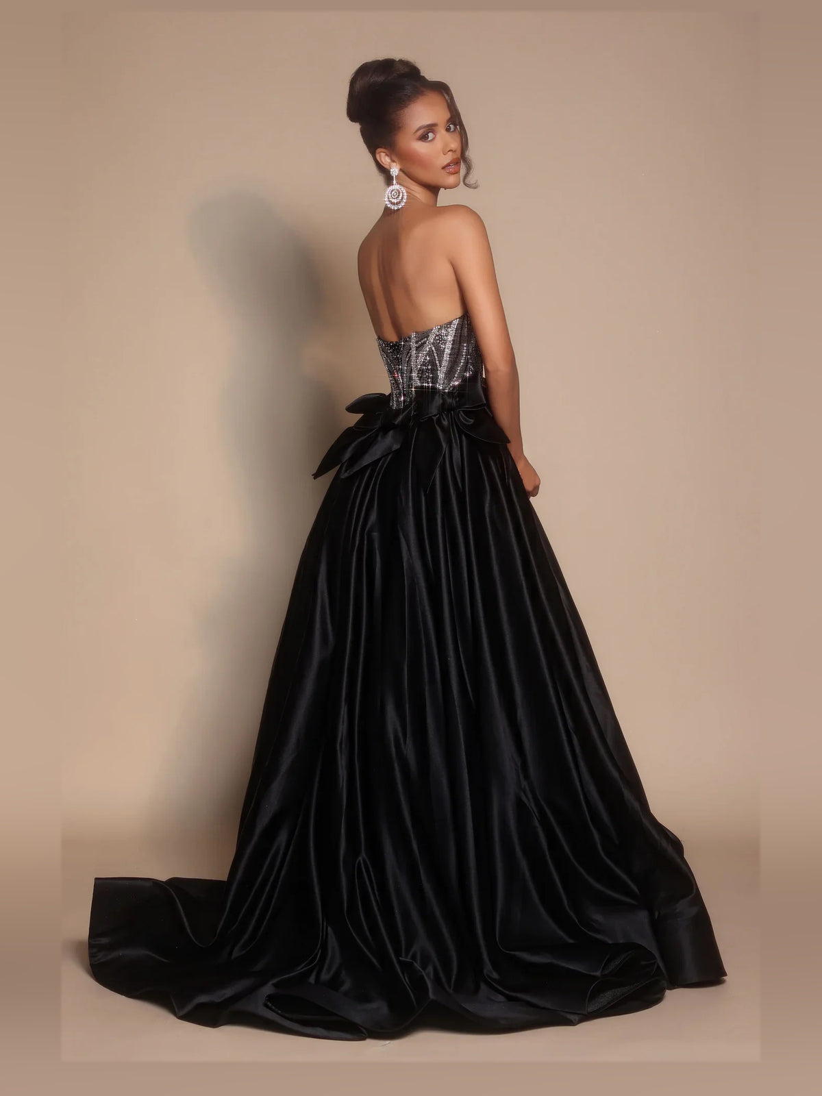 Black floor-length prom dress, alternate view showing the dress shape and hem