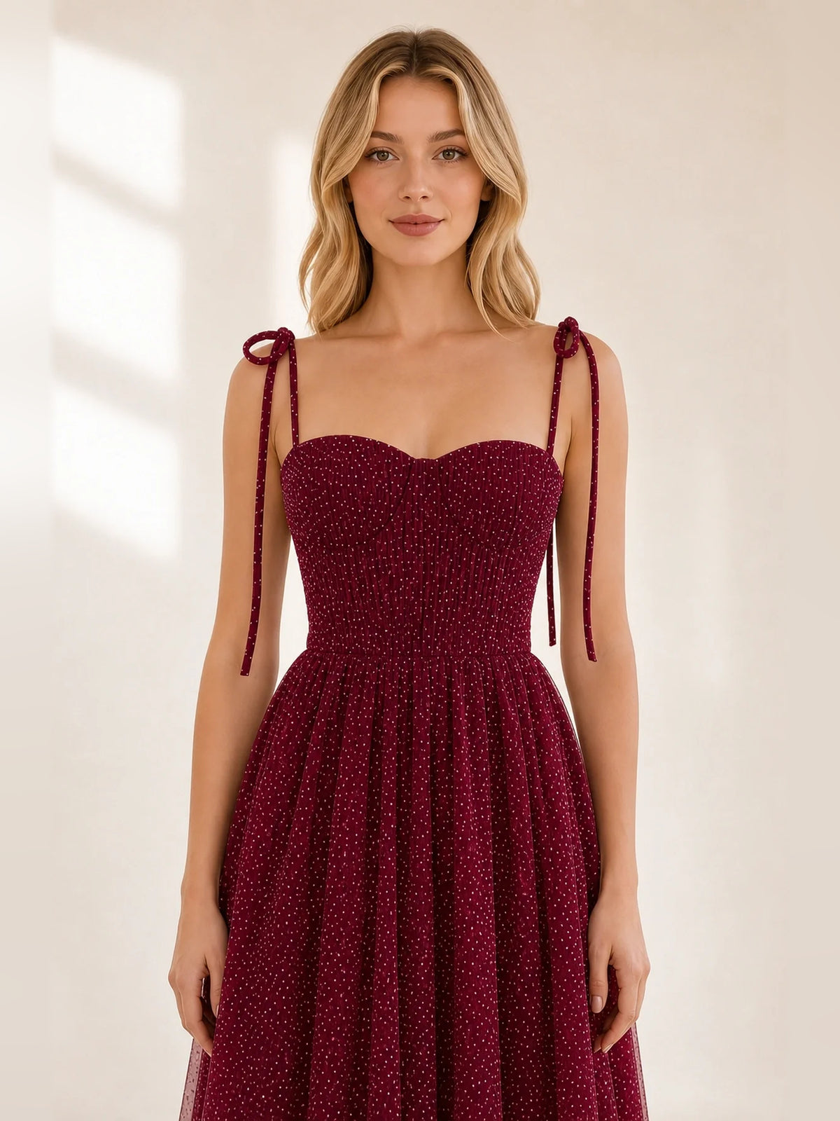 Burgundy midi homecoming dress, alternate view showing the dress shape and hem