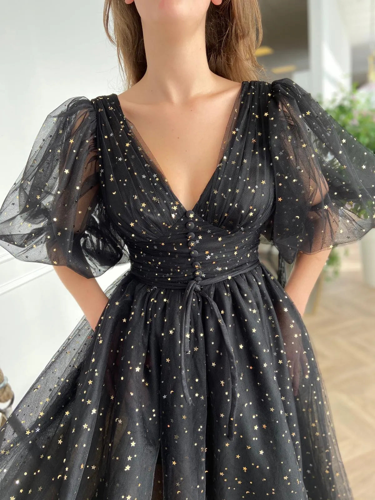 Black midi prom dress, alternate view showing the dress shape and hem