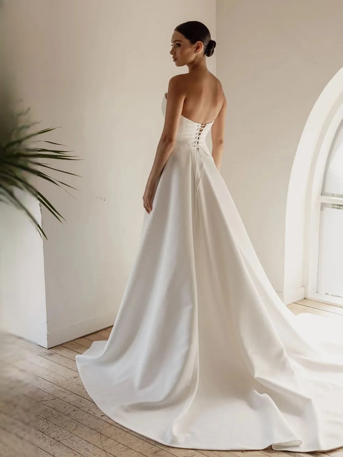 Ivory floor-length wedding dress, alternate view showing the dress shape and hem