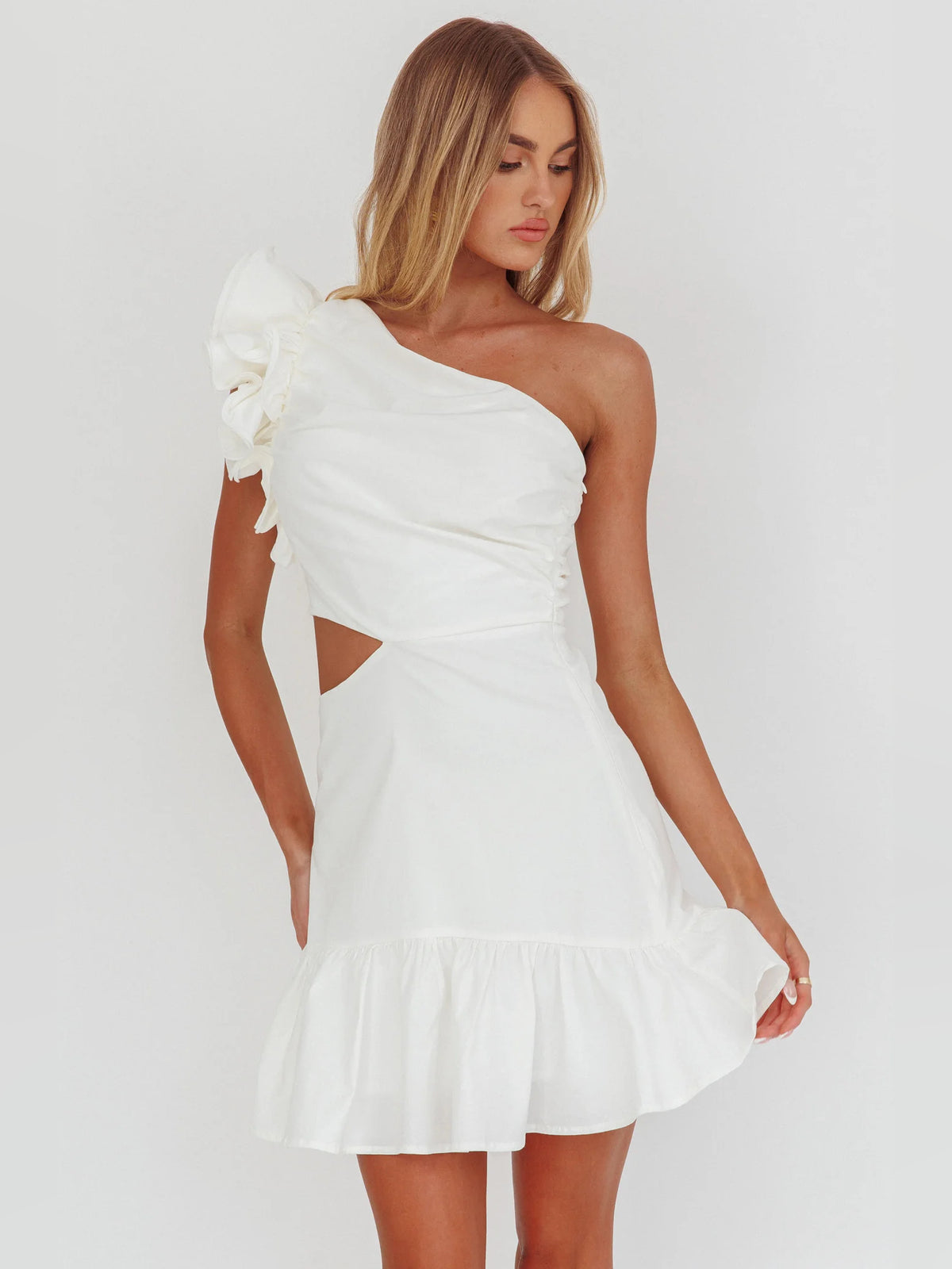 White mini homecoming dress, alternate view showing the dress shape and hem