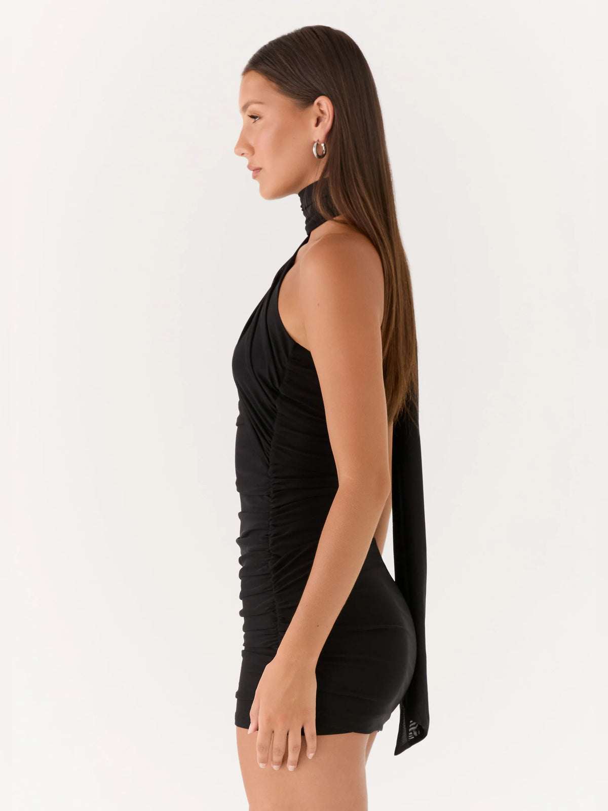 Black mini homecoming dress, alternate view showing the dress shape and hem